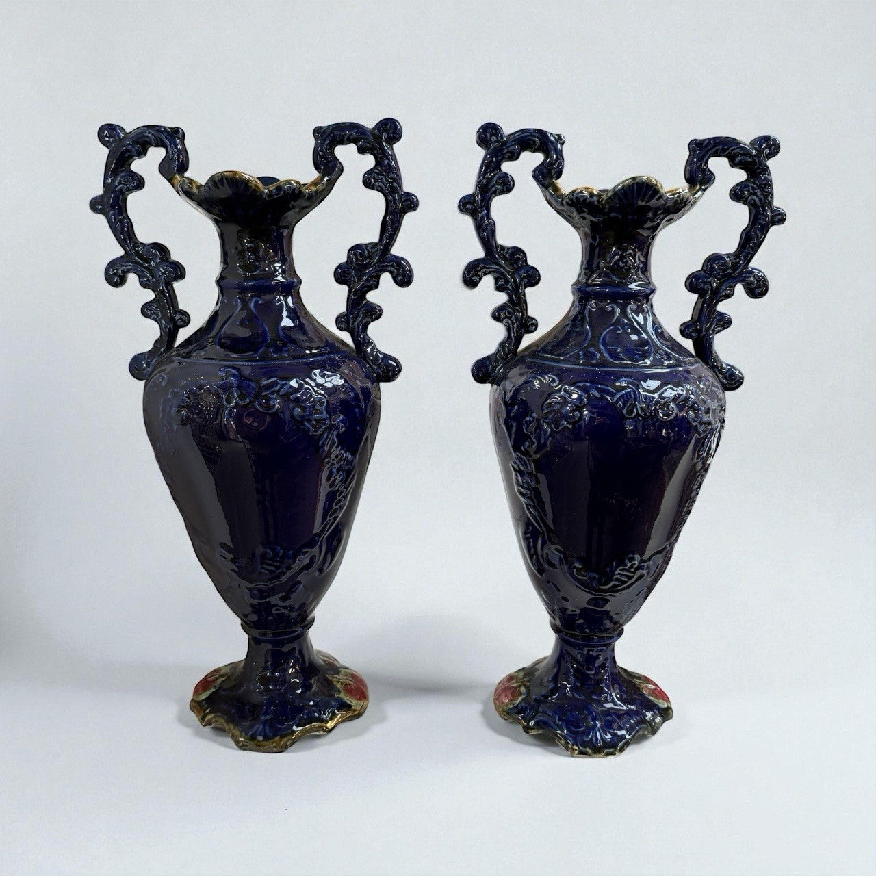 Pair of Antique Rococo Style Hand Painted Porcelain Urns with Figural Scene